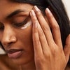 Model Applying Radiant Eye Cream