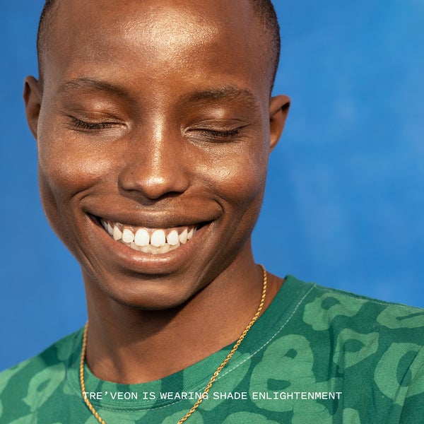 Model wearing gleam on highlighting balm