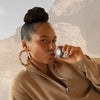Alicia Keys Holding Comforting Balm