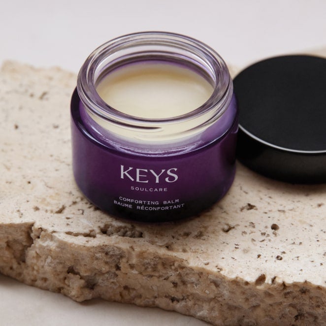 Applying Comfort Balm on lips