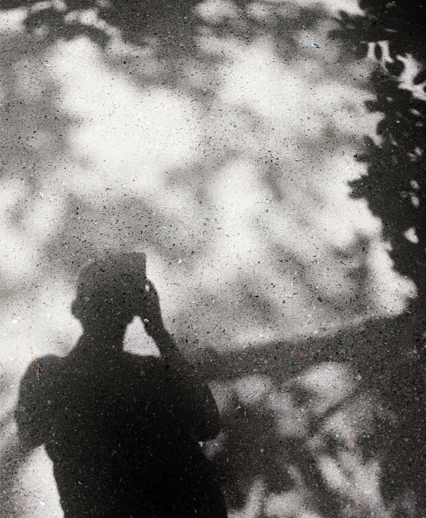 Black and white picture of a person's shadow