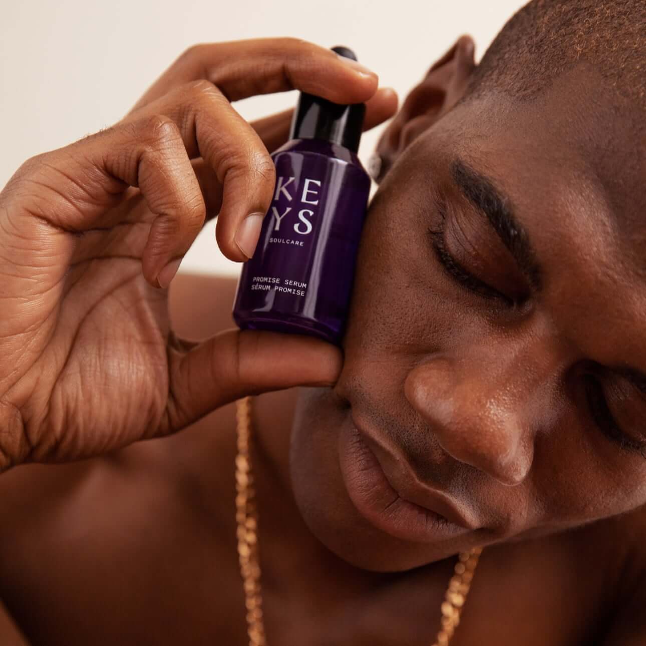 Man holding the Promise Serum